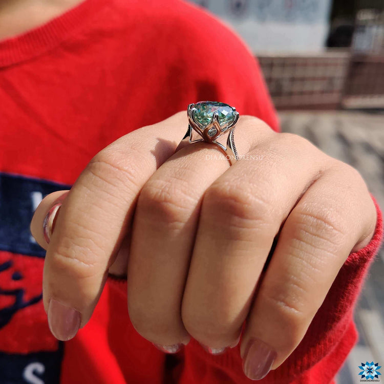 Yellow gold cathedral setting engagement ring.