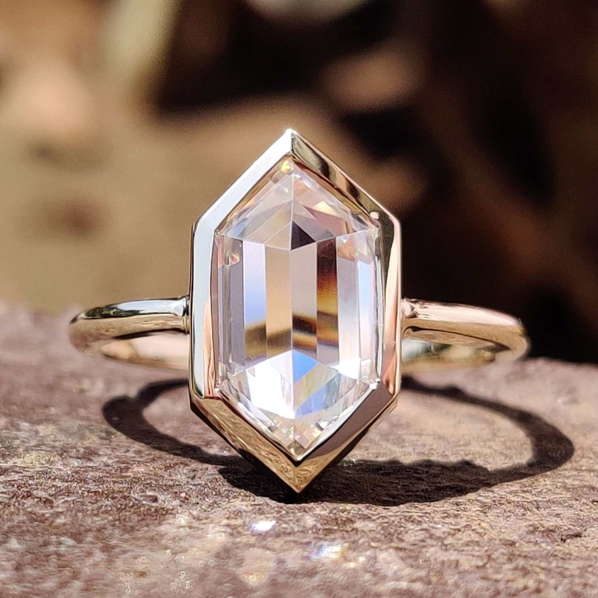 Hexagon rose cut moissanite engagement ring in white gold.