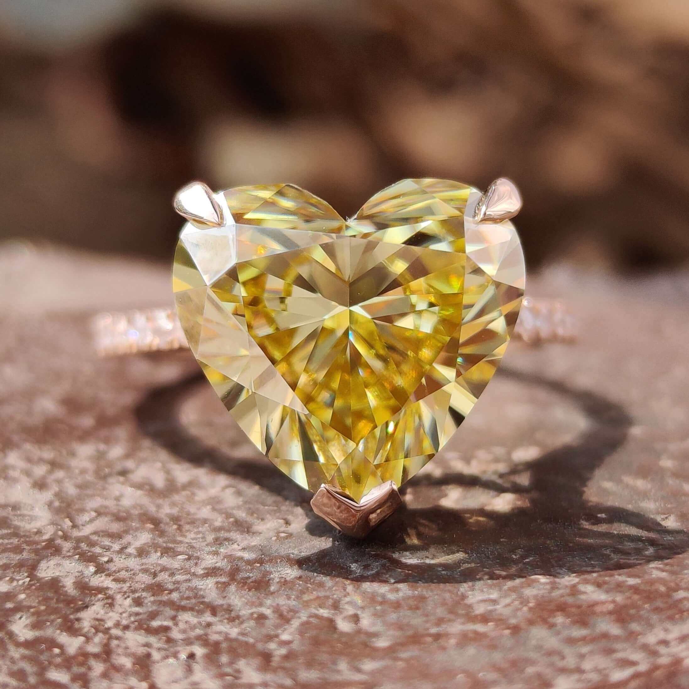 Heart shape moissanite ring in rose gold.