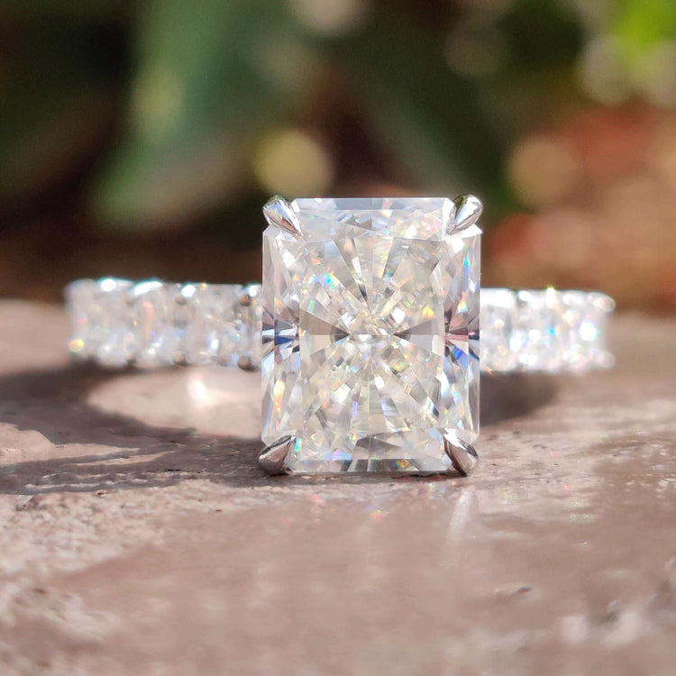 Radiant cut hidden halo ring in white gold.