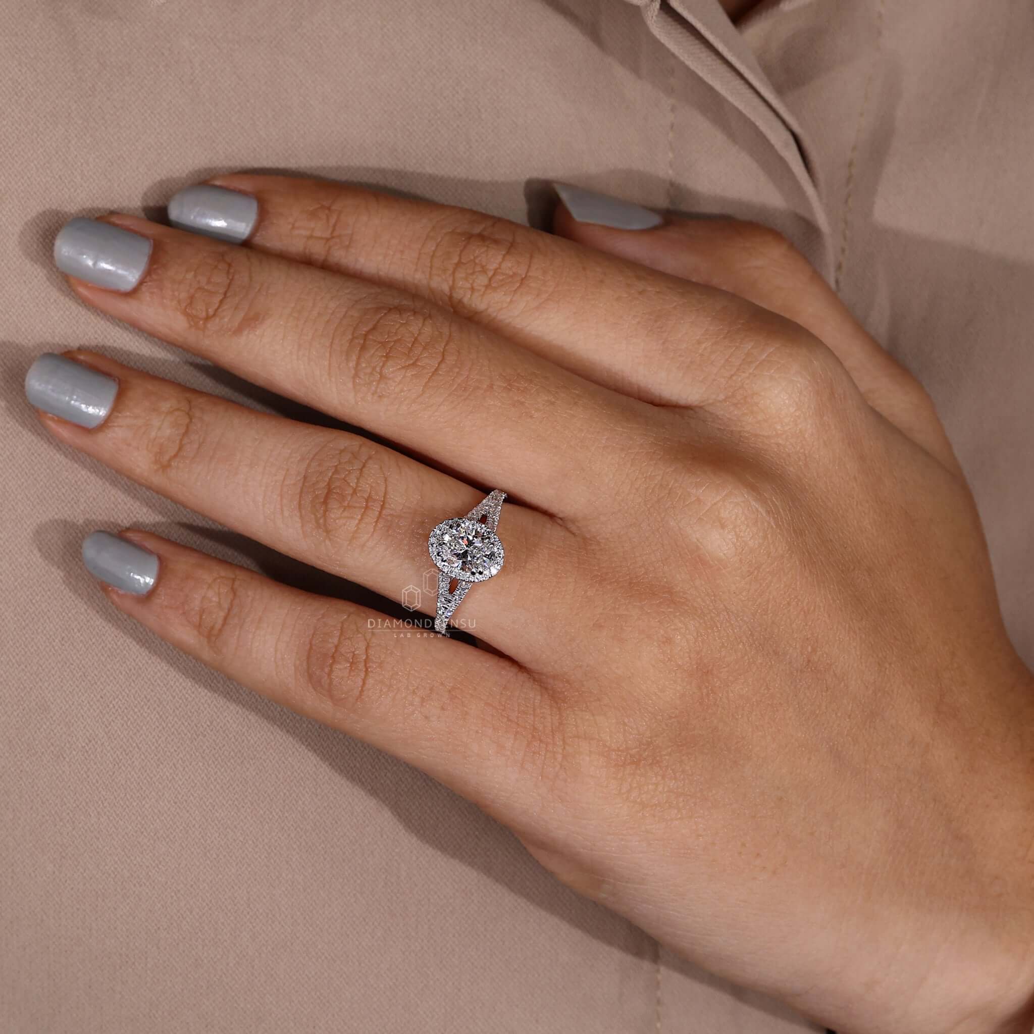 Engagement ring with pave diamonds and a unique oval design.