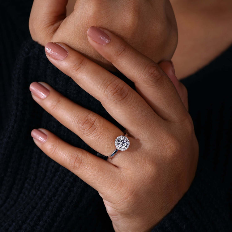 Round brilliant cut diamond set in a halo ring, a perfect combination for a sophisticated diamond ring uk style.