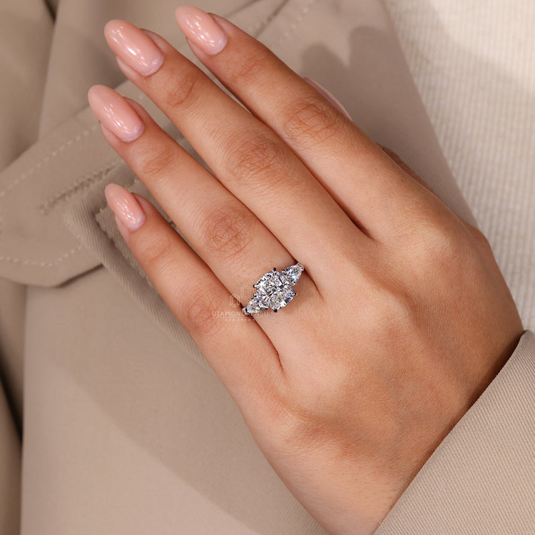 Pear Cut Ring included as a side diamond design.
