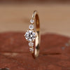 5 stone engagement ring in yellow gold.