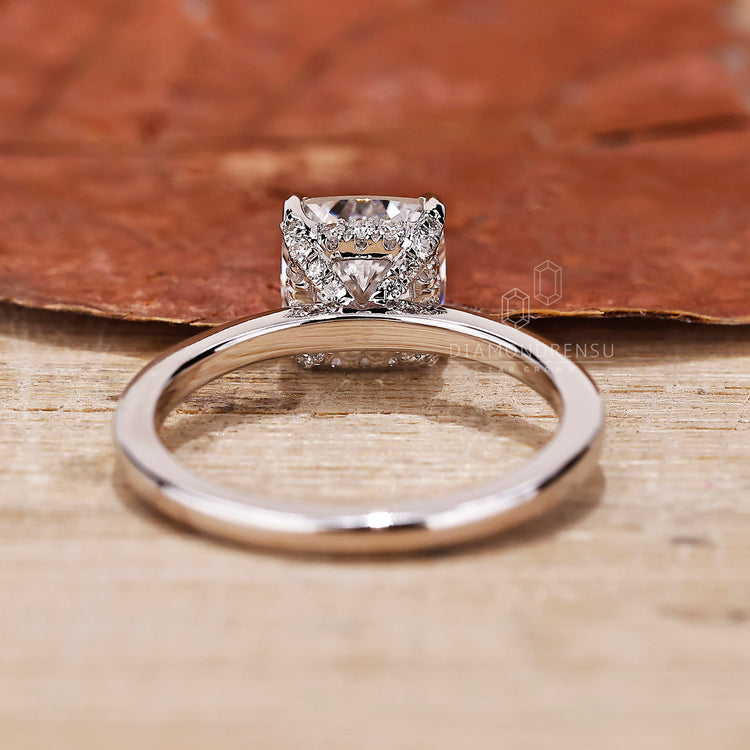 White gold ring with hidden halo engagement ring style.