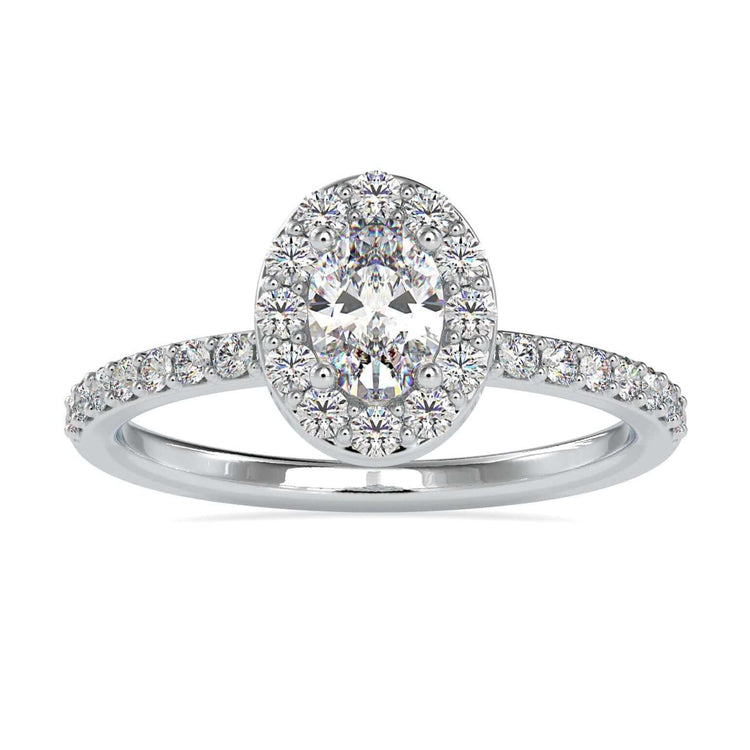 Oval diamond engagement ring in white gold with round prong setting.