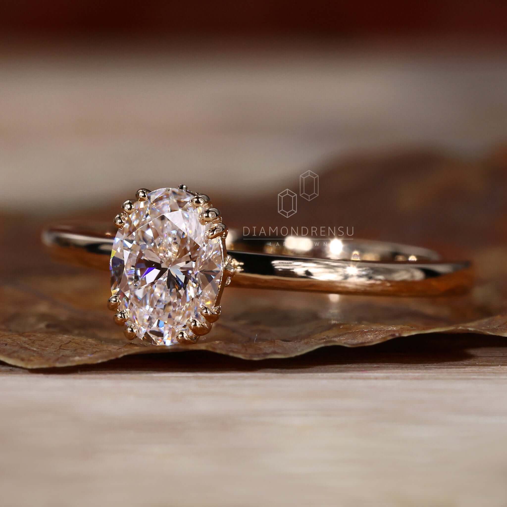 Elegant oval engagement ring crafted for women in the UK.