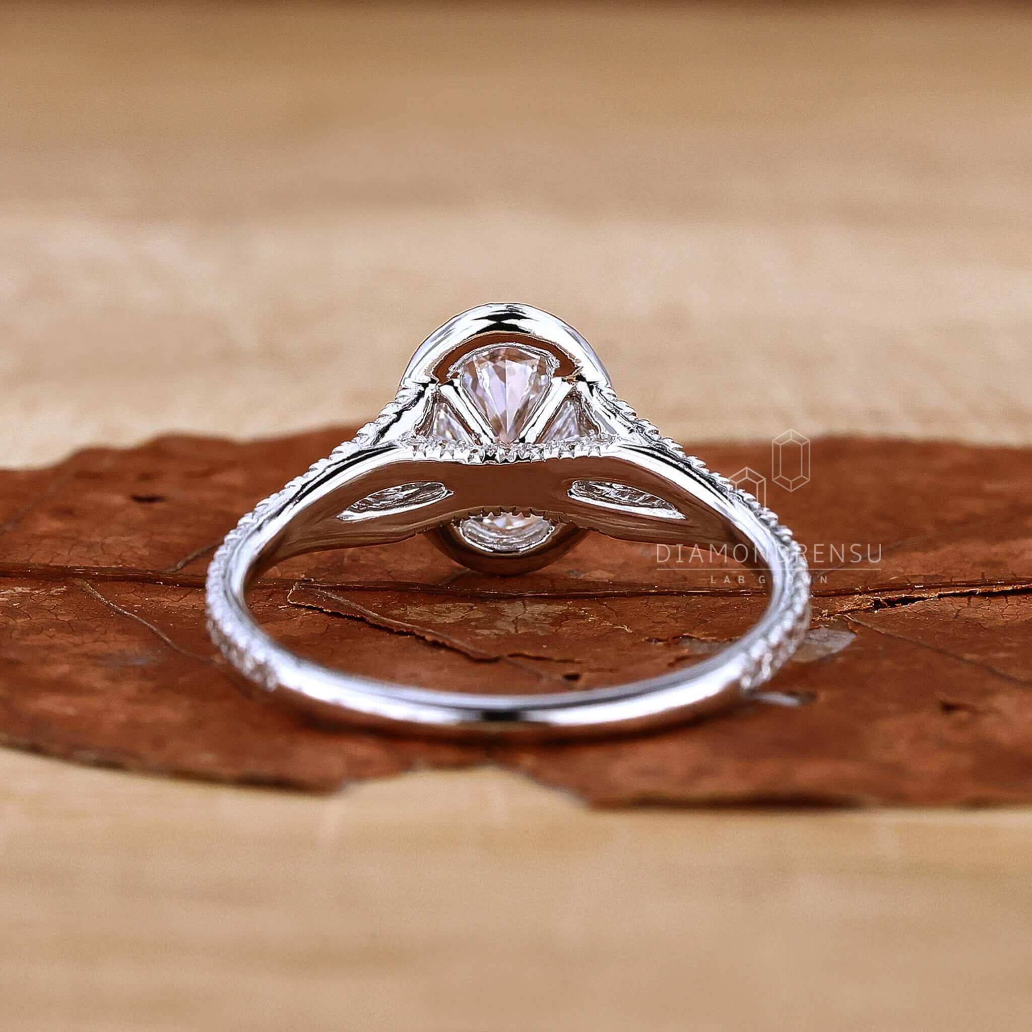 Engagement rings oval with 2 ct diamond in a split shank design.