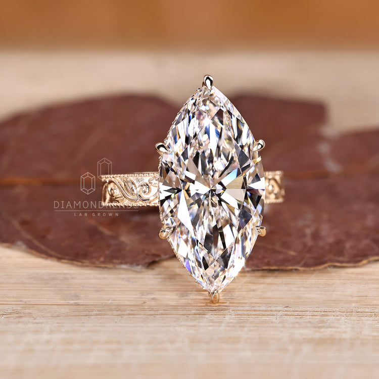Handmade diamond ring with marquise cut and filigree work