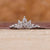 Marquise diamond wedding band designed in a curved tiara shape. Marquise diamond wedding band designed in a curved tiara shape.