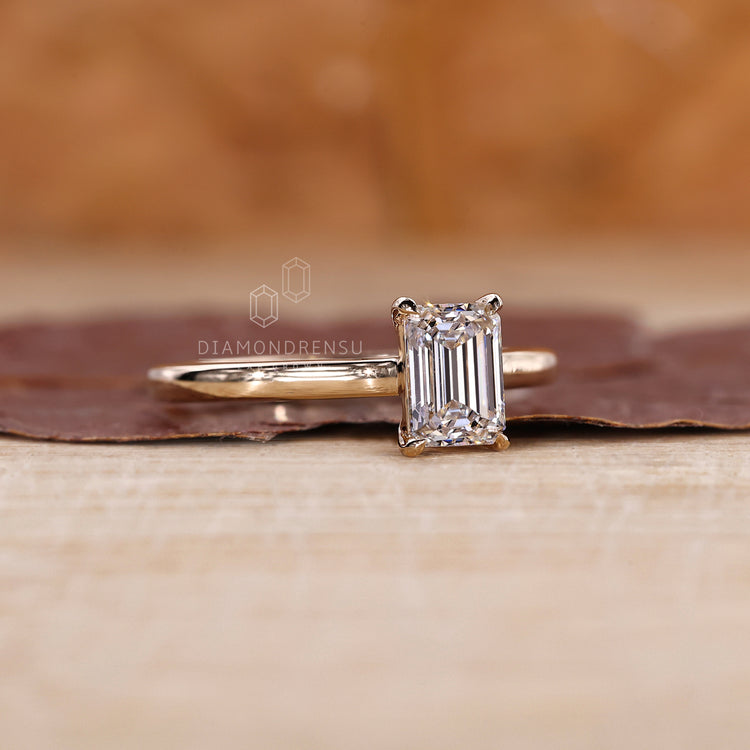 Lab grown diamond solitaire ring with cathedral setting.