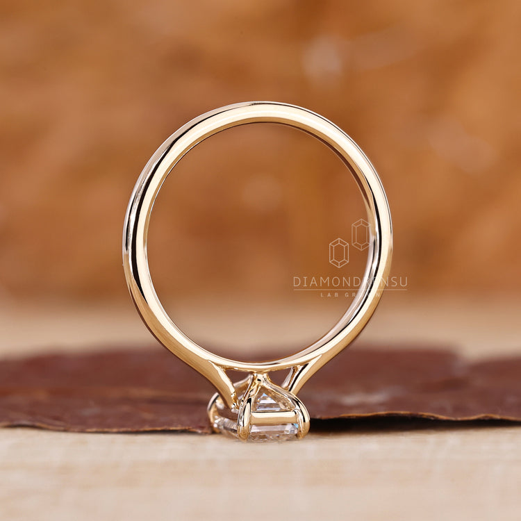 Handmade ring with 4 claw prong set design.