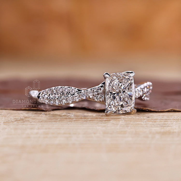 Elongated Cushion Cut Diamond Ring With Twisted Pave Band