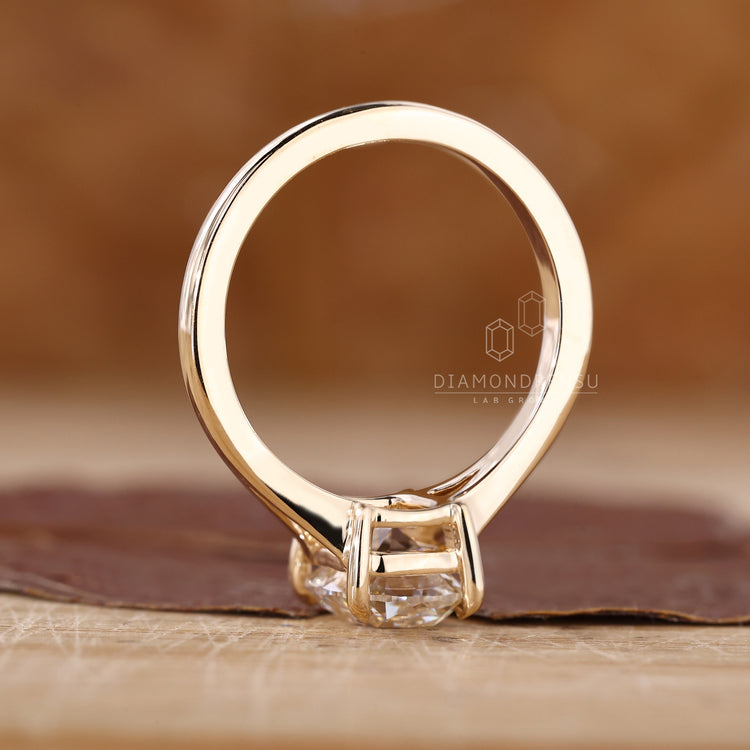 UK engagement ring with old mine cut cushion diamond.