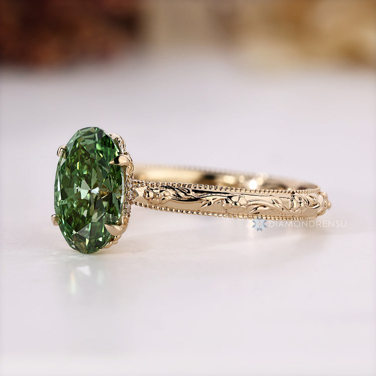 Lab grown diamond ring with four claw prong setting.