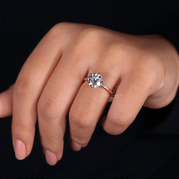 6 prong ring on claw prong solitaire diamond ring