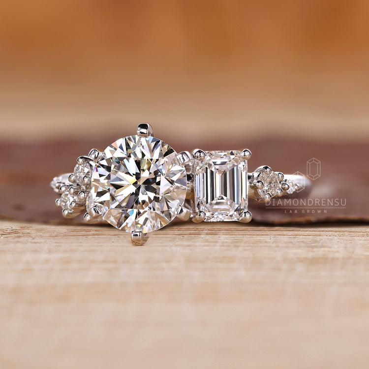 Emerald diamond ring crafted in white gold.