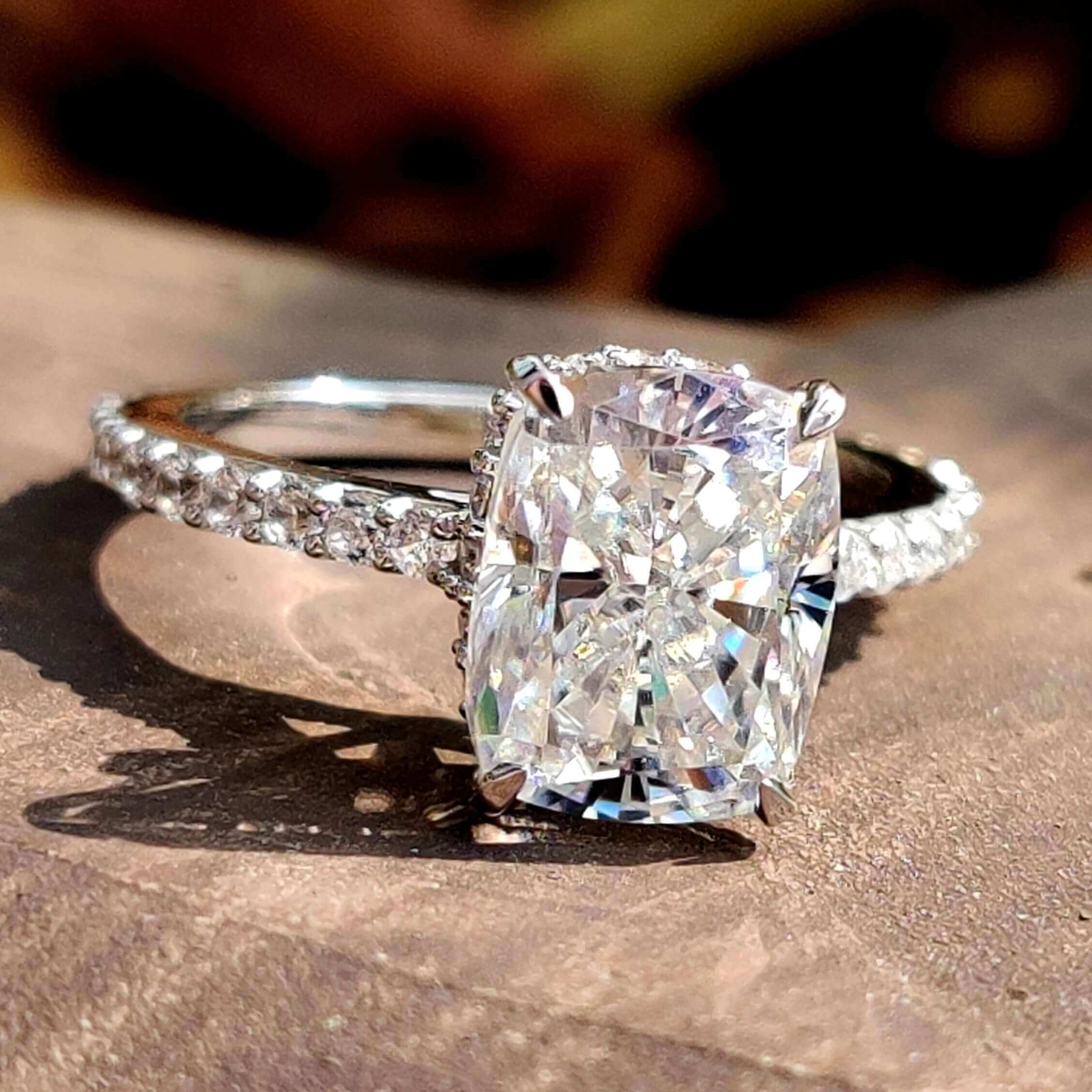 Elongated crushed ice cushion cut moissanite ring.