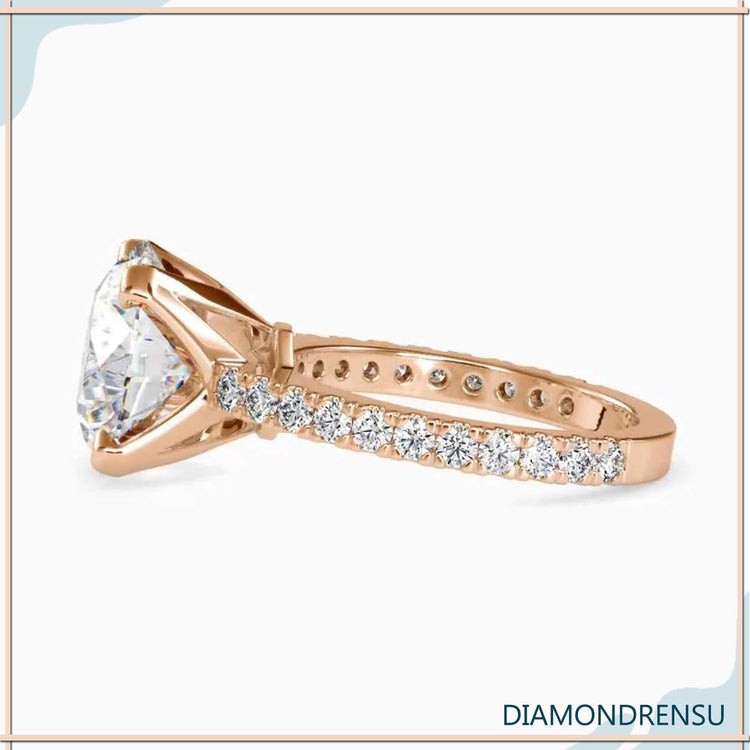 Rose gold diamond ring with handmade design.