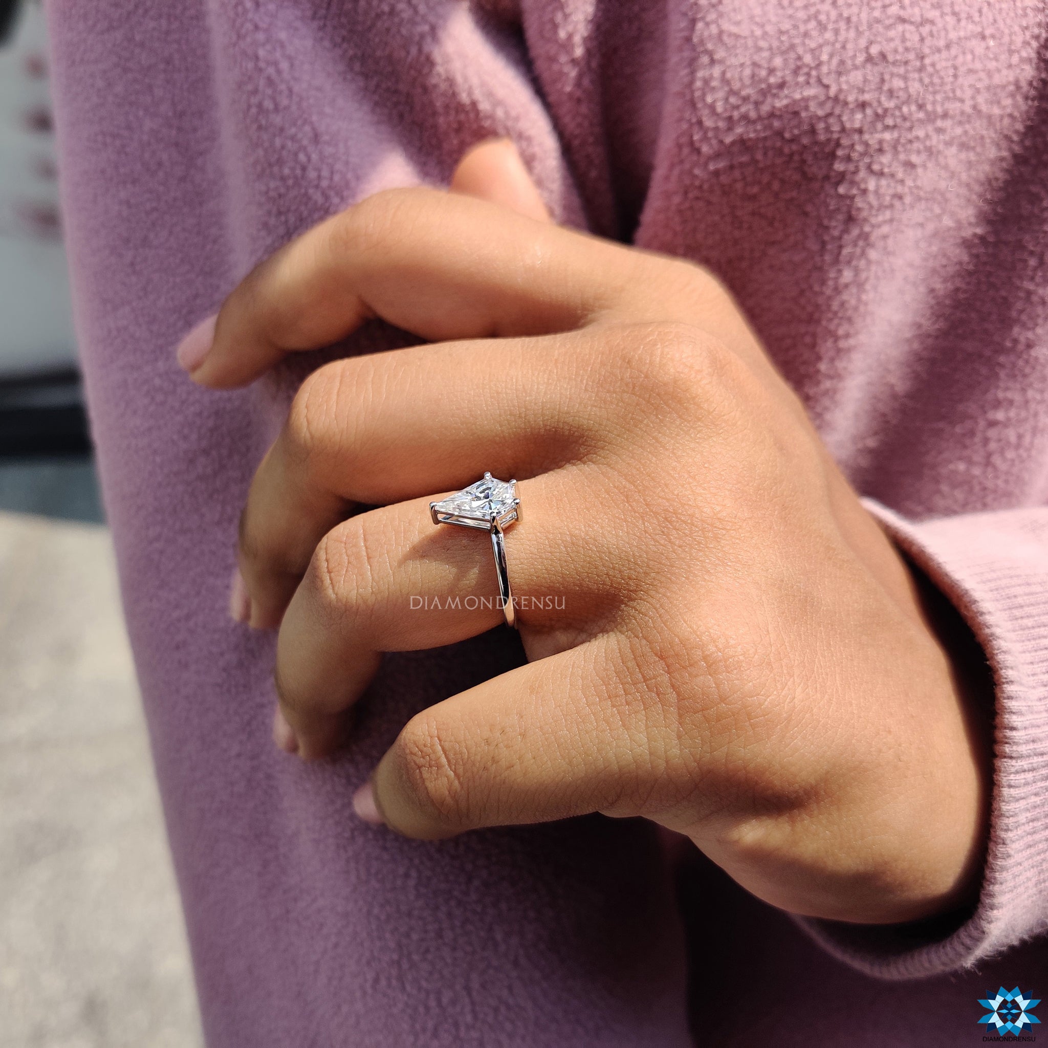 Moissanite engagement ring in white gold with a classic solitaire style.