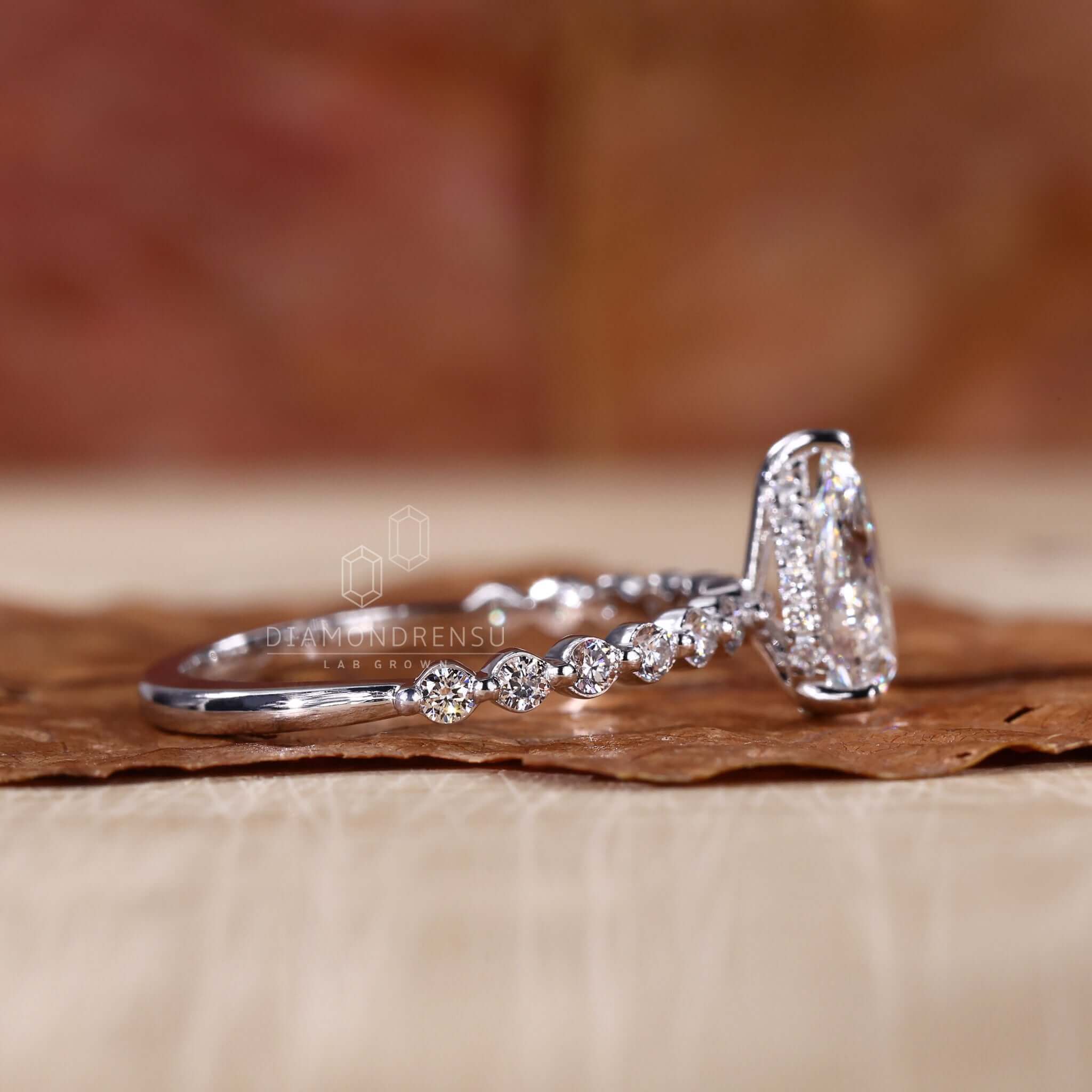 Prong setting ring showcasing a pear-shaped diamond perfect for timeless engagement moments.