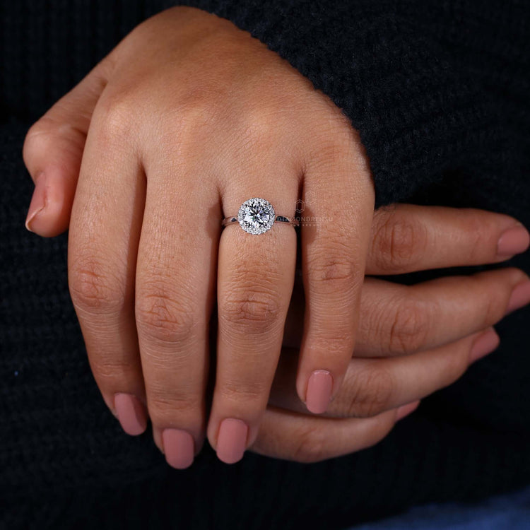 Halo engagement rings with a white gold engagement ring design, crafted with handmade jewelry expertise.