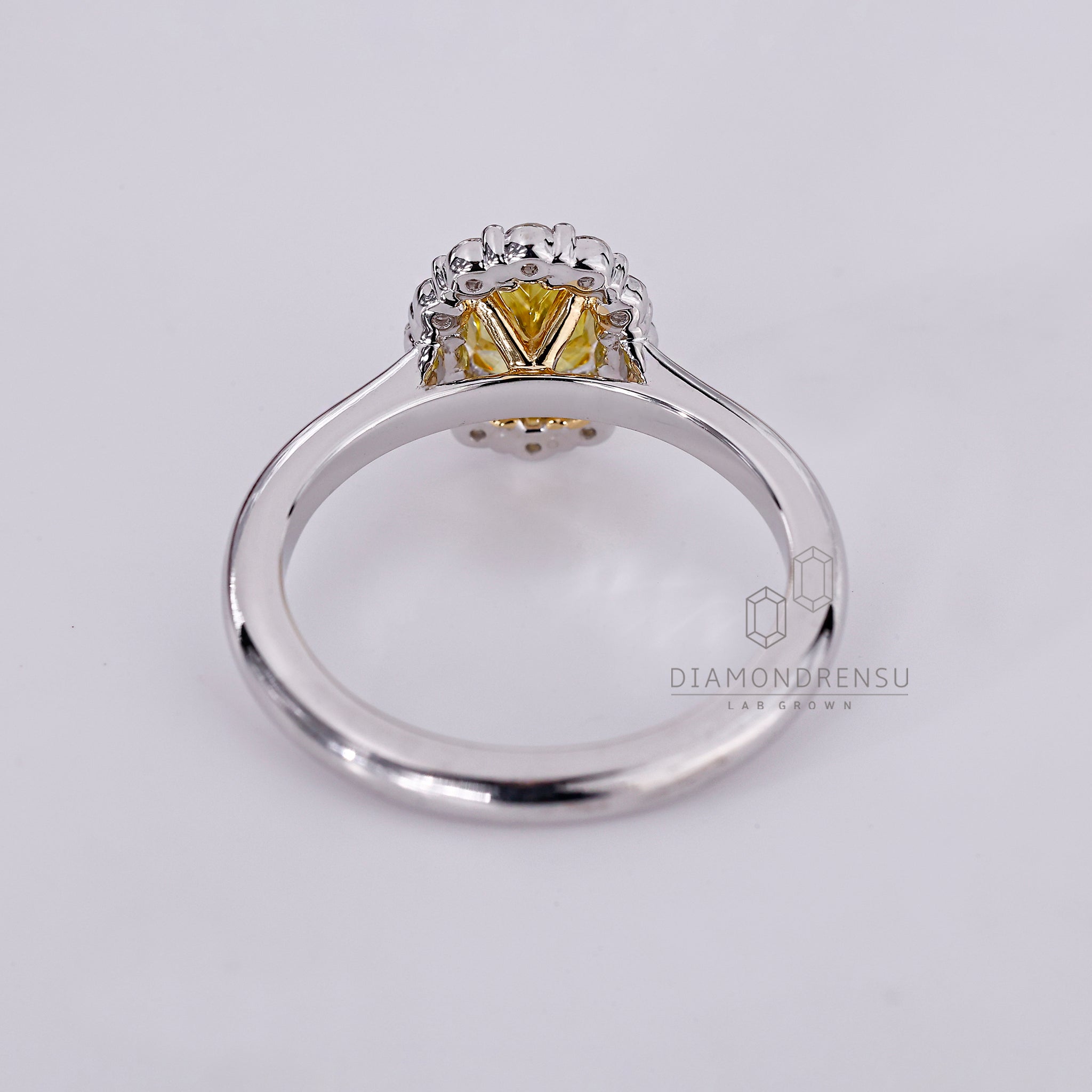 Designer engagement ring with cluster halo style.