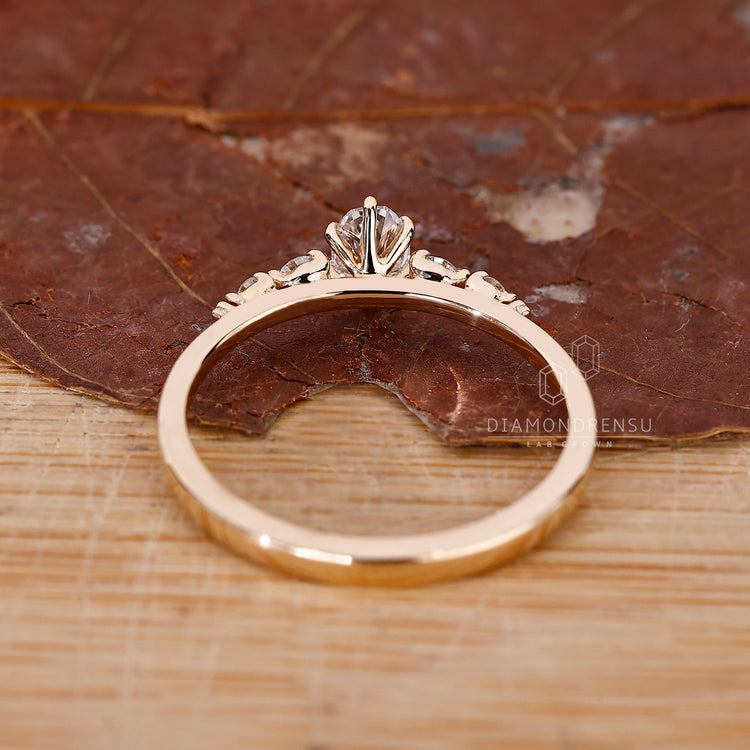 Yellow gold engagement ring with handmade design