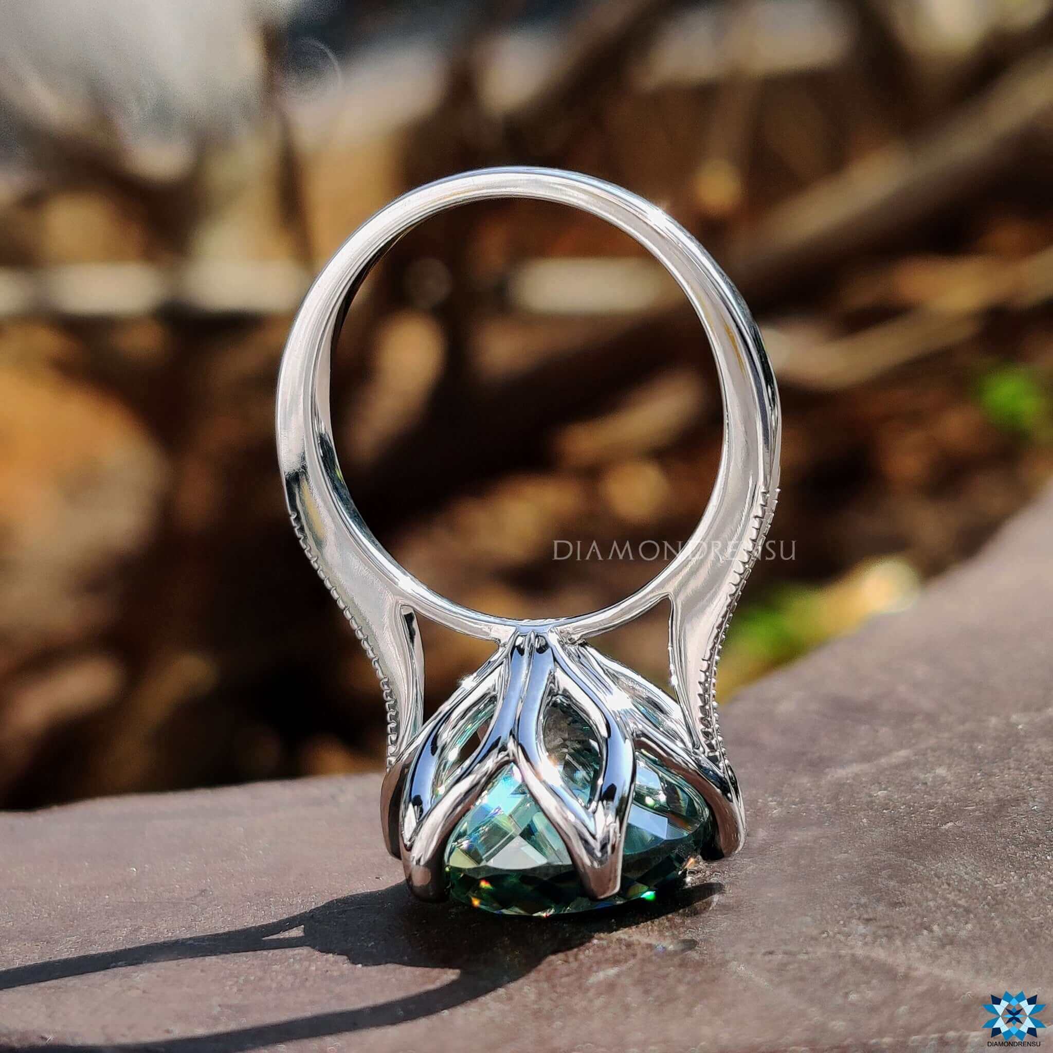 Handmade cathedral setting moissanite ring.