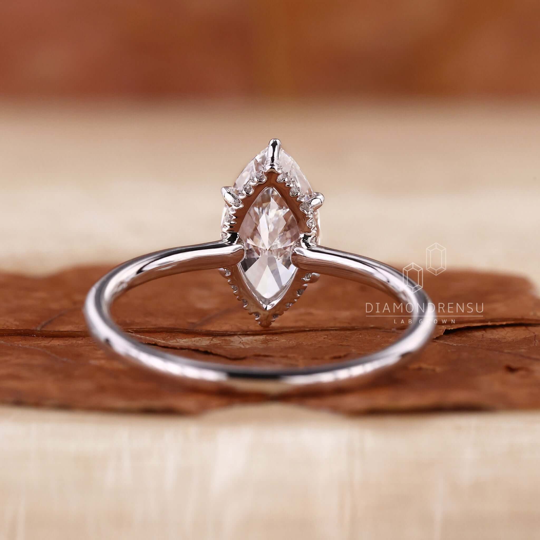 Handmade hidden halo diamond ring designed for timeless beauty.