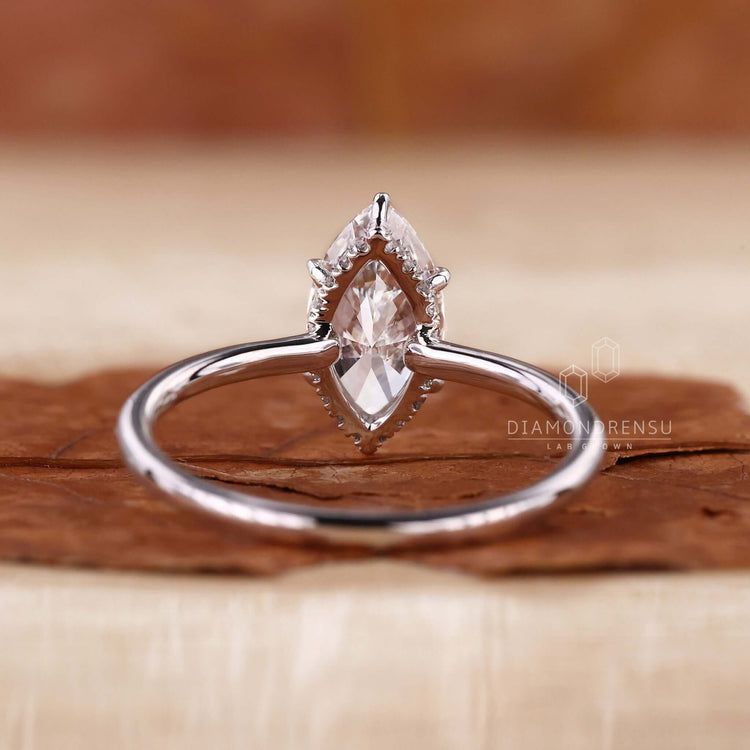 Handmade hidden halo diamond ring designed for timeless beauty.