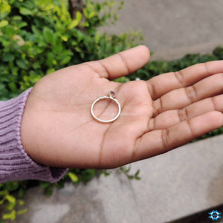 Buy engagement ring with 1 carat round moissanite and elegant pave band.