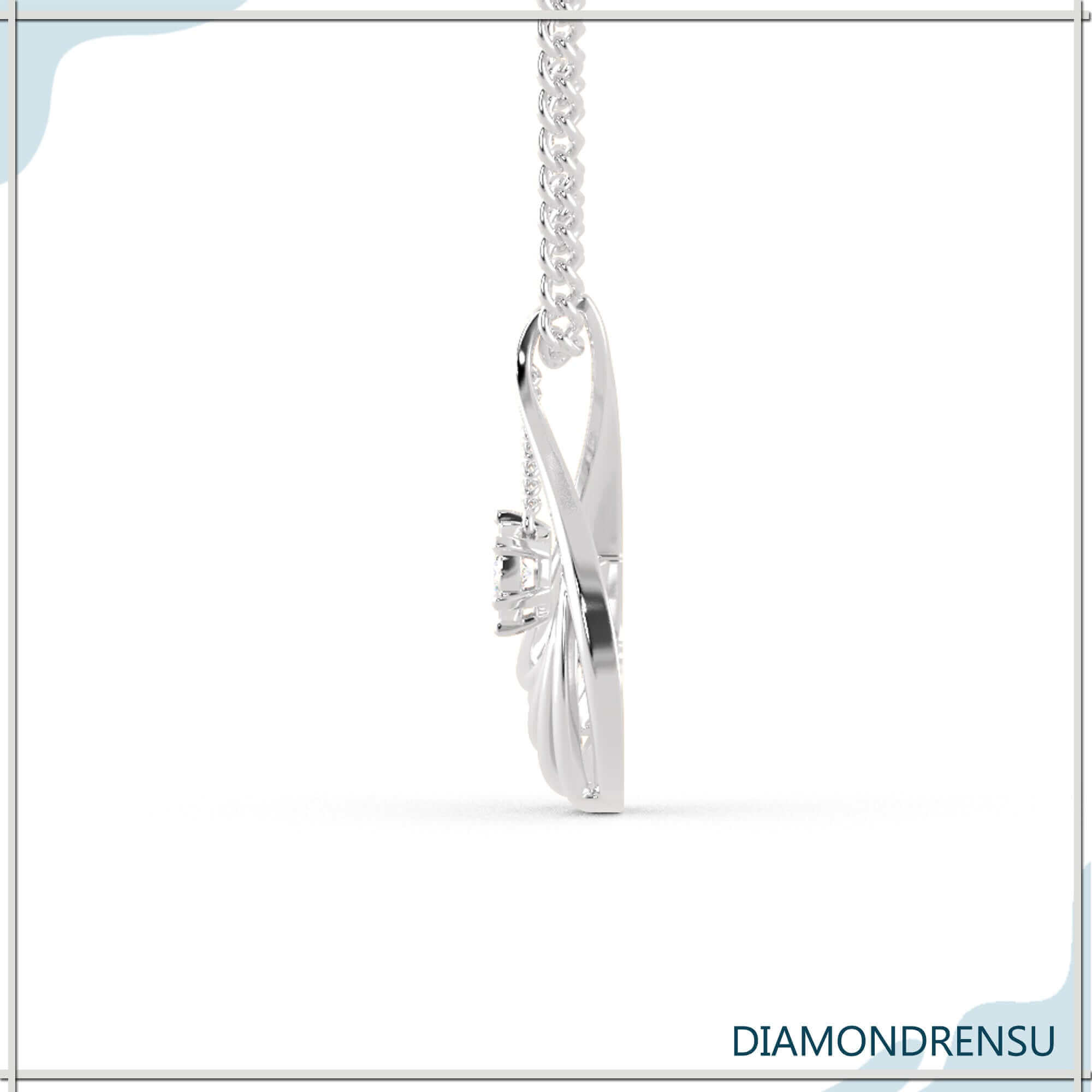 UK diamond pendant in teardrop frame with brilliant cut diamond.
