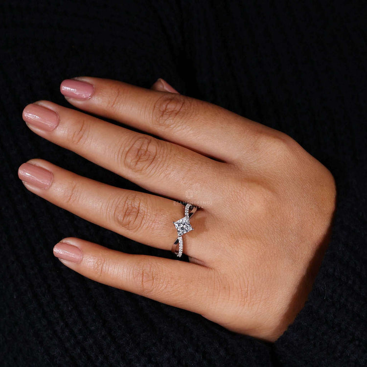 Princess cut twisted ring with a handmade jewellery finish.