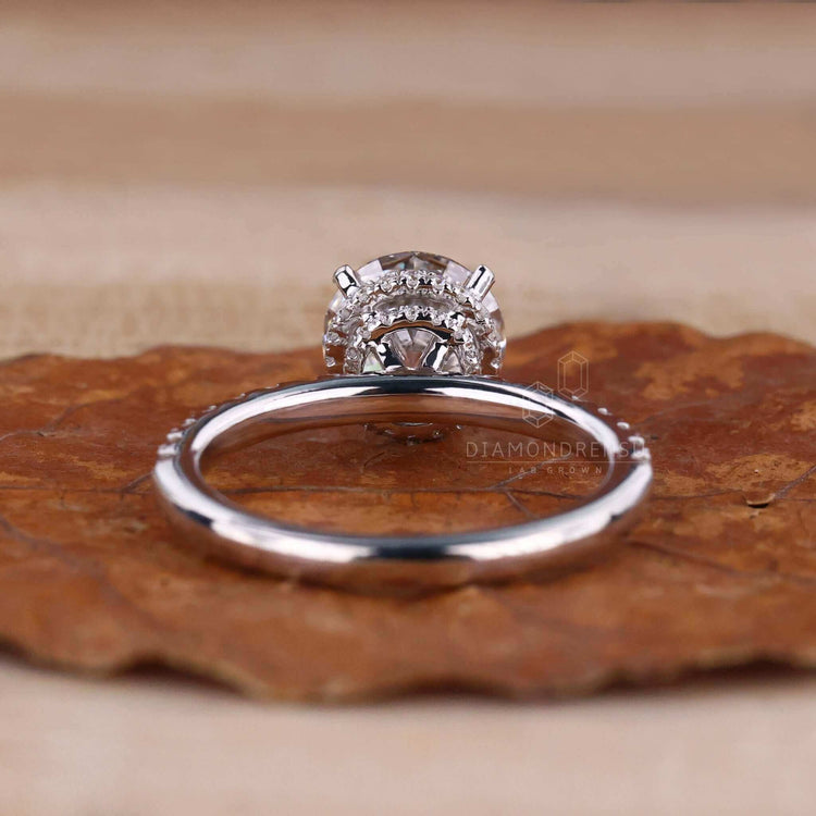 A radiant hidden halo diamond ring that adds a contemporary touch to style.
