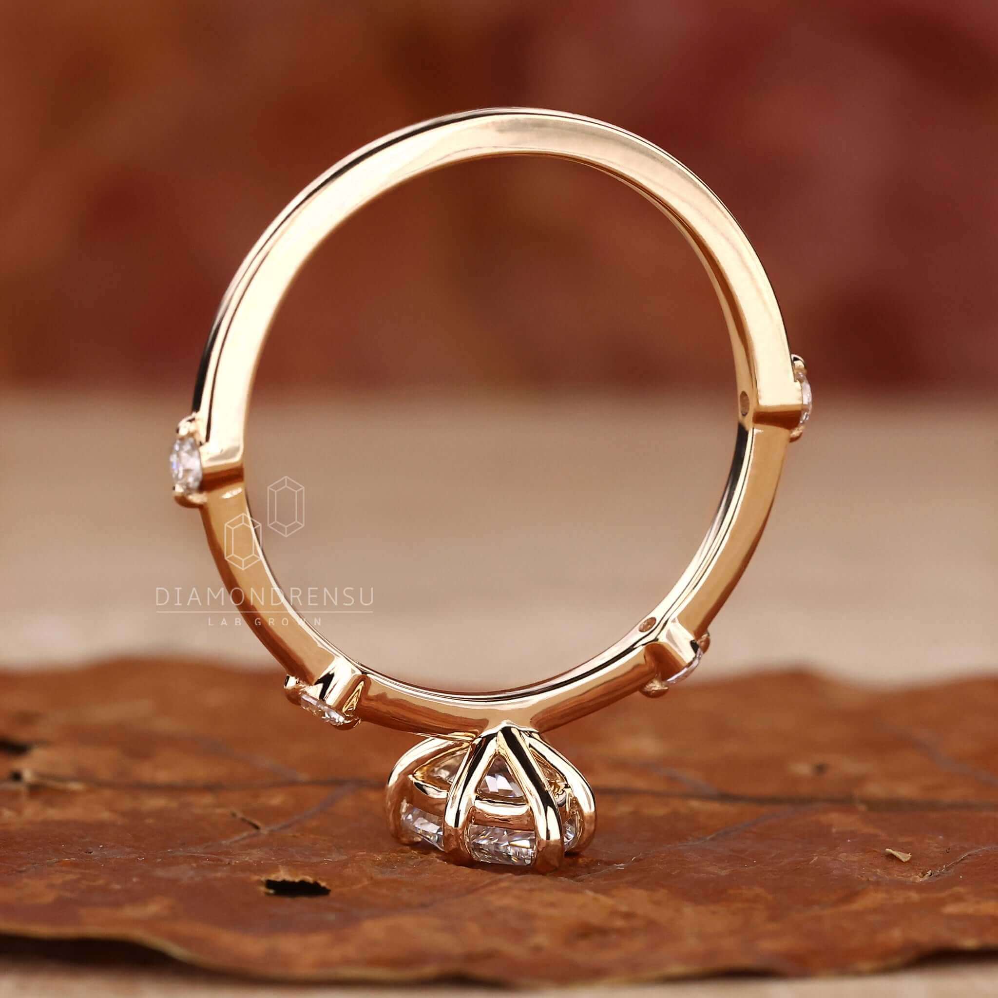Pear cut diamond engagement ring set in a handmade jewelry design, showcasing ethical beauty with igi certified quality.