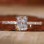Radiant engagement ring with claw prong setting for elegance.
 Radiant engagement ring with claw prong setting for elegance.