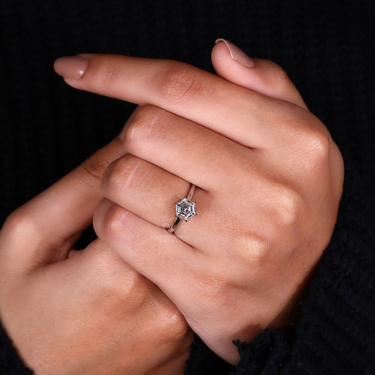 Cathedral setting ring featuring a 6 prong claw mount.