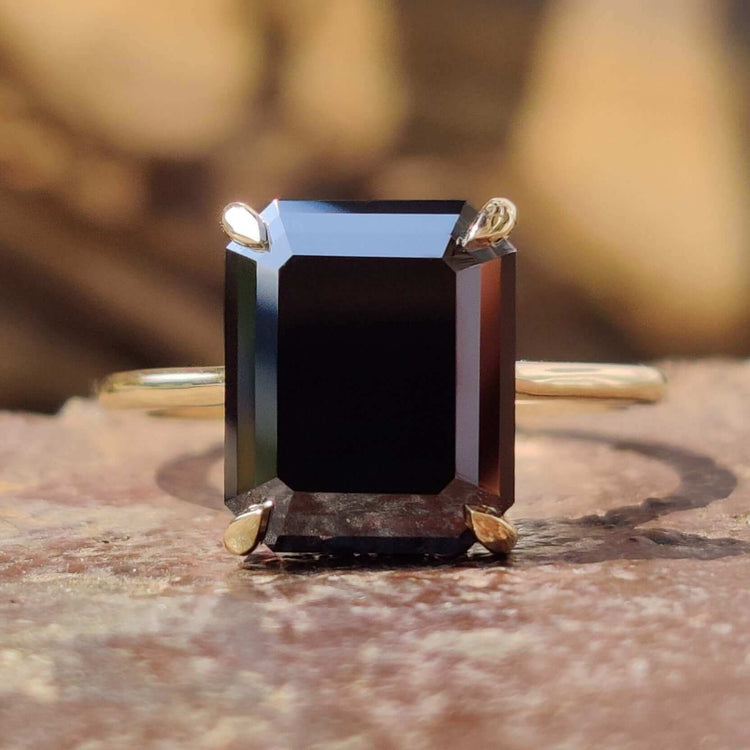 Black moissanite emerald cut ring.