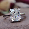 Elongated cushion OEC moissanite engagement ring in white gold.