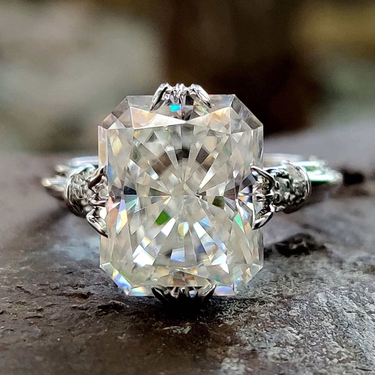 Radiant cut moissanite engagement ring in white gold.