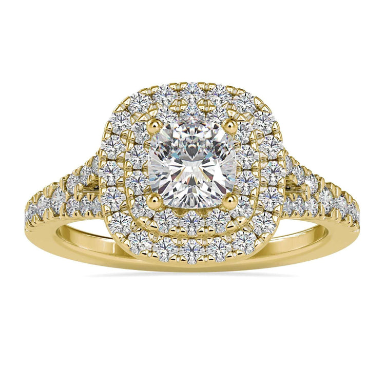 Double halo engagement ring with cushion cut diamond in white gold.