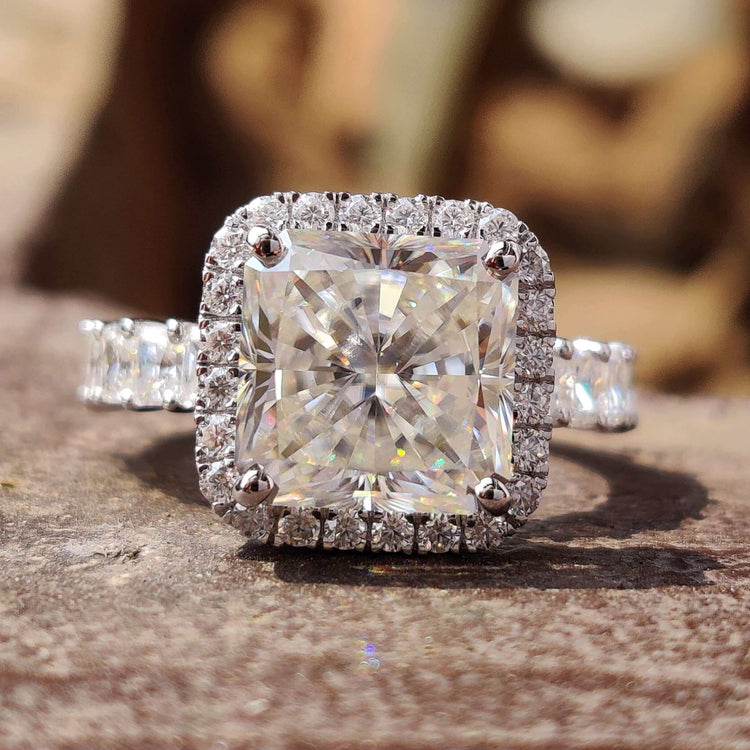 Square radiant cut moissanite engagement ring with pave halo in white gold.