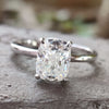 Elongated cushion moissanite engagement ring in white gold.