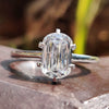 Criss cut engagement ring with cushion moissanite center.