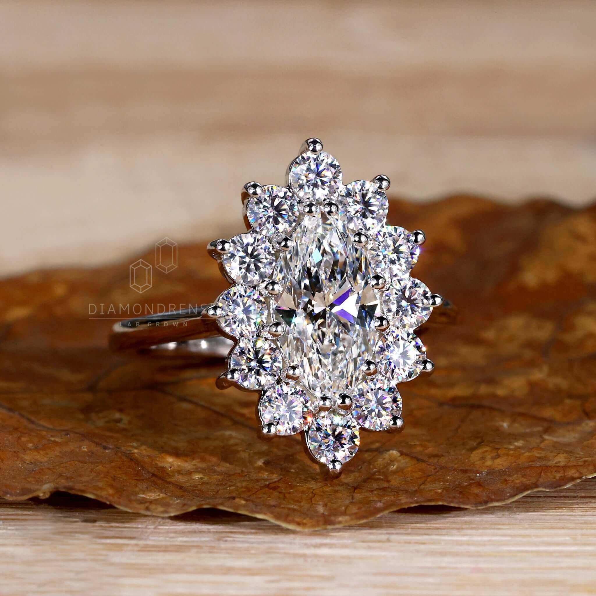 Ring cluster with prong engagement ring design showcasing a round diamond for added sparkle and elegance.