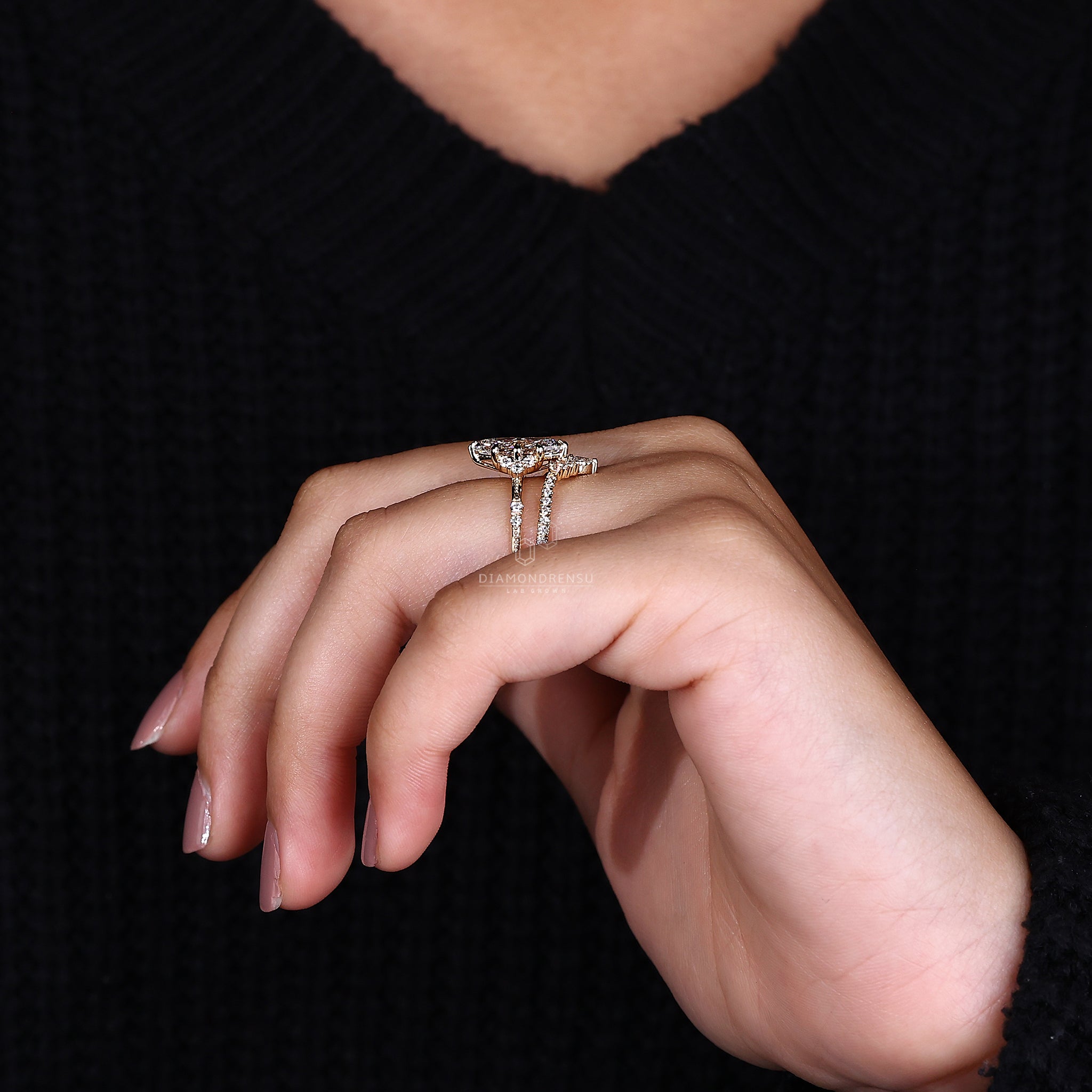 Handmade bridal set featuring a claw prong ring and prong set band.