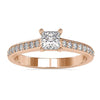 Channel set engagement ring with princess cut centre stone.