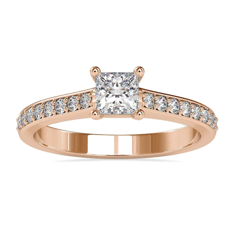 Channel set engagement ring with princess cut centre stone.
