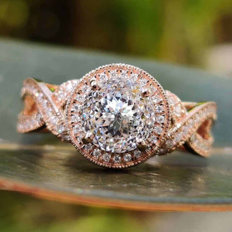 Portuguese cut moissanite engagement ring in rose gold.